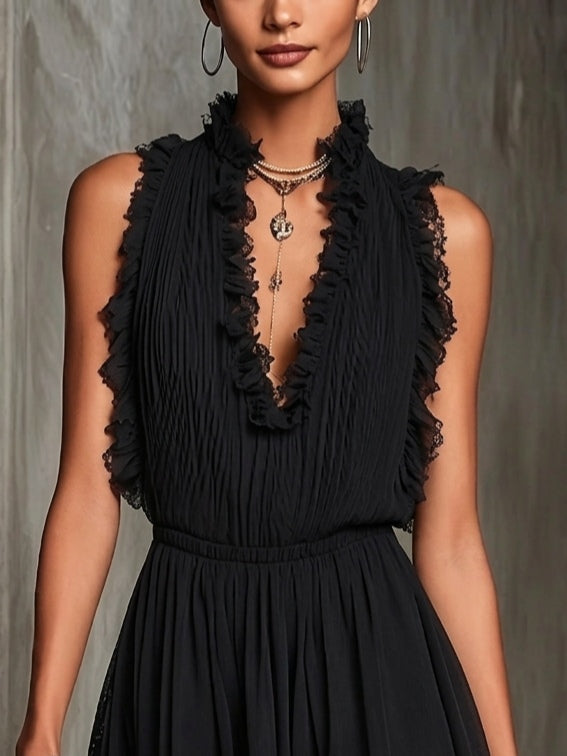 Tuta in Chiffon Pieghettato Nero con Bordo a Ruches